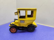 Yellow Taxi Tin Litho Friction Made in Japan Sign of Quality. 5  x2.75  