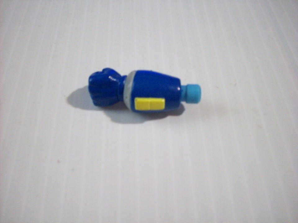 An original 1995 Bandai/Capcom Mega Man blue fist/arm accessory part — a genuinely rare vintage piece from a beloved gaming franchise that's nearly impossible to find intact.