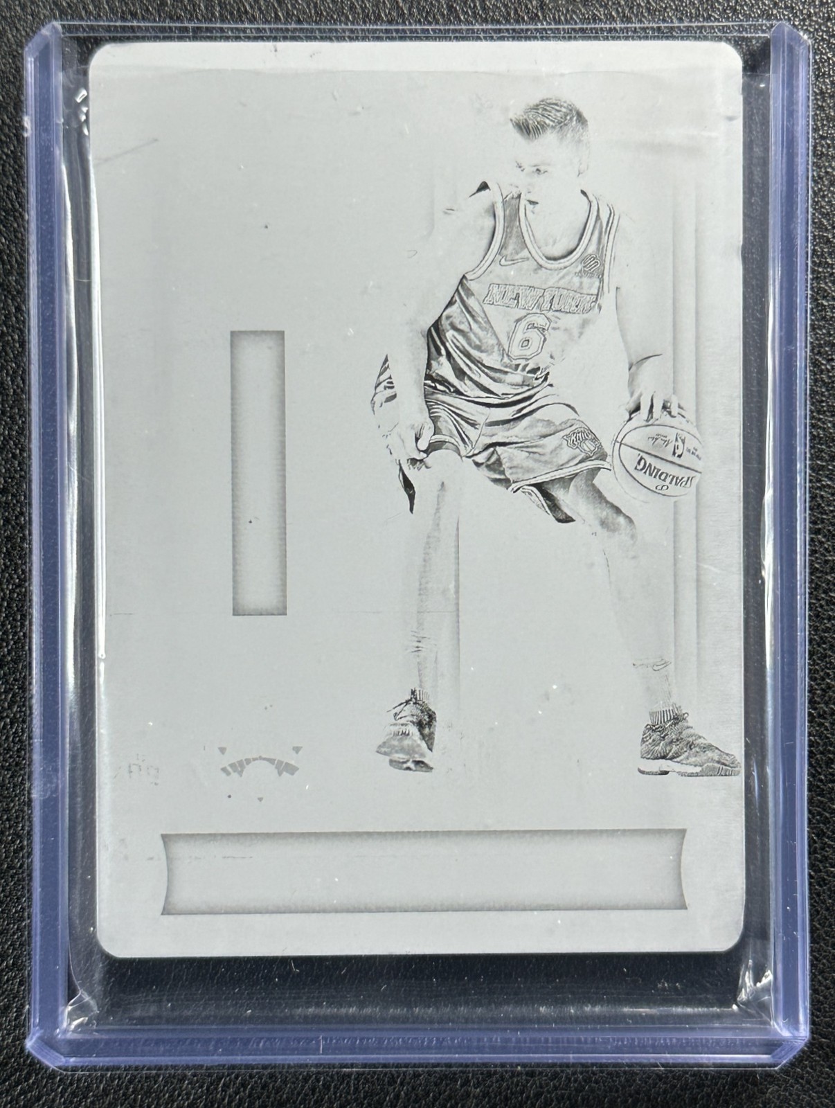 KRISTAPS PORZINGIS 2017-18 NATIONAL TREASURES GAME GEAR BLACK PRINTING PLATE 1/1 view 1