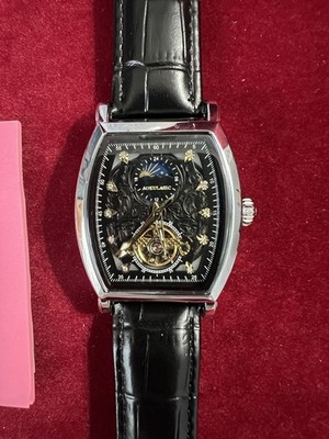 AOKULASIC automatic mechanical watch with a skeleton design and a black leather
