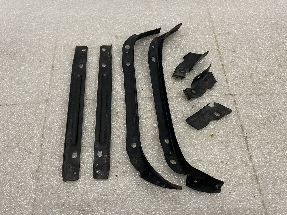 1987-89 Nissan Z31 300ZX OEM Front Bumper Headlight Cover Brackets