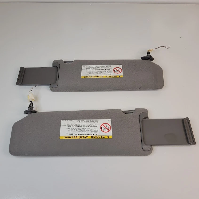 Par de parasoles gris tela con luces de espejo OEM Toyota Avalon 2002-2004 Foto 3 de 4