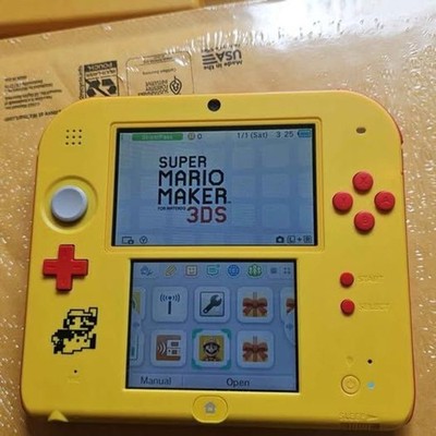 Nintendo 2DS XL Super Mario Maker Edition yellow handheld