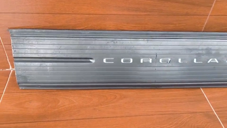 Toyota Corolla AE100 AE101 Sedan Rear Center Garnish Panel GENUINE