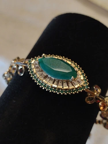 Vintage Costume Jewelry Bracelet - Green Gem Main - Surrounding Spinning Gems