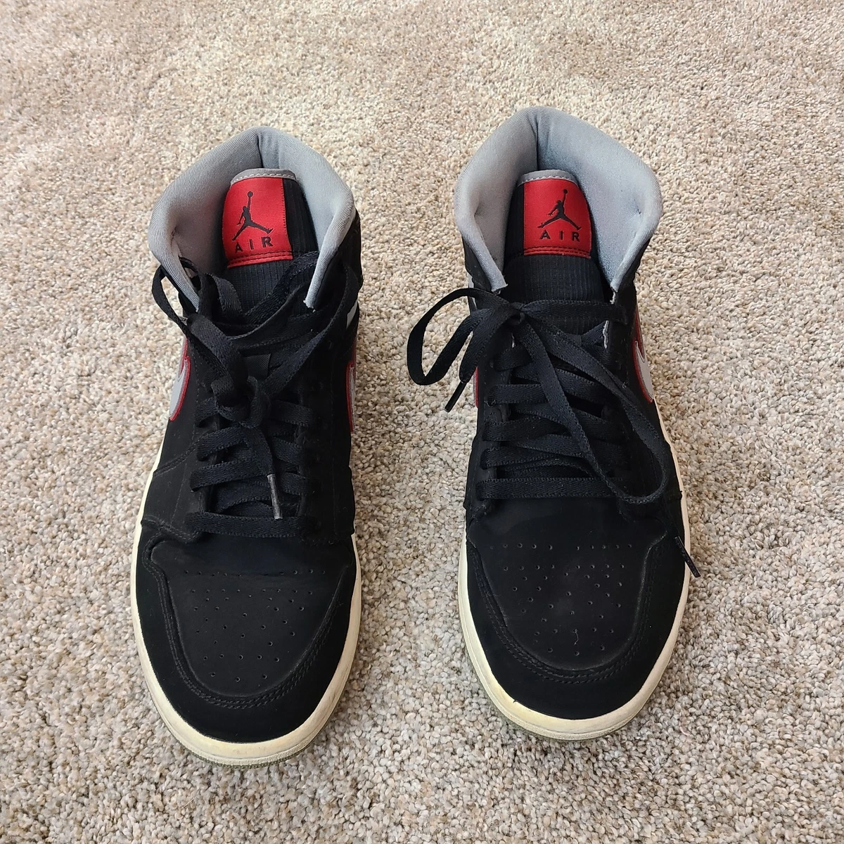 Black grey red jordan best sale 1