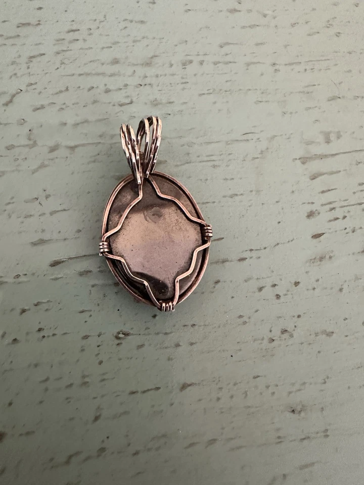 Colgante de hematita envuelto en plata Foto 3 de 4