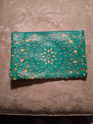 Carlos Santana wristlet clutch purse, EUC, Teal and Ivory , laser cut
