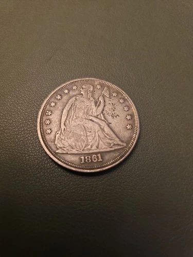 1861-P Seated Liberty Dollar — photo from the most recent tracked eBay sale