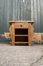 Oak side table/occasional table/cabinet with two magazine racks
