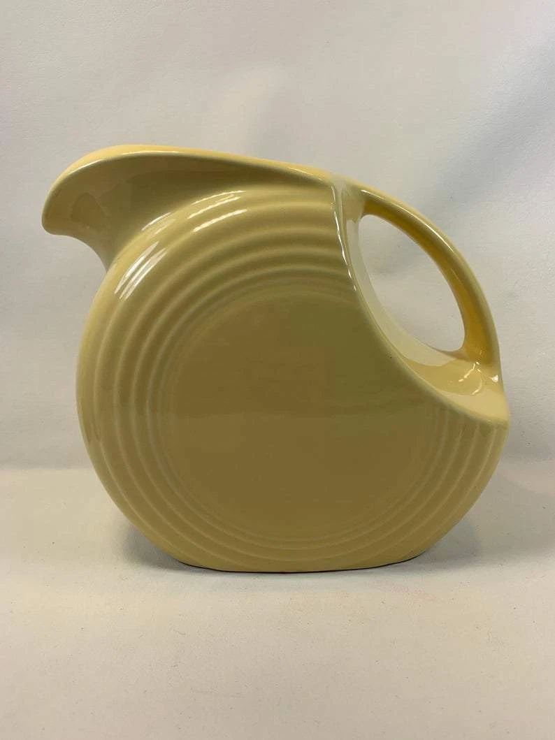 Fiestaware top yellow pitcher