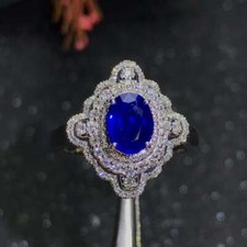 Dark Blue Oval Cut 1.59CT Sapphire With Sparkling White CZ Cluster Wedding Ring