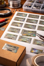 1000 CUSTOM PRINTED TAMPER EVIDENT SILVER HOLOGRAM LABELS STICKERS .75 X .60 IN.