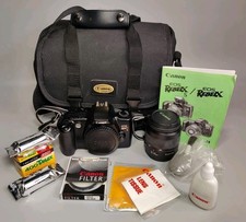 Canon EOS Rebel X S 35mm Film SLR Camera Bundle Extras 35-80mm Zoom Lens Tested