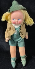 Vintage children's cloth doll with plastic face.  German or Bavarian style