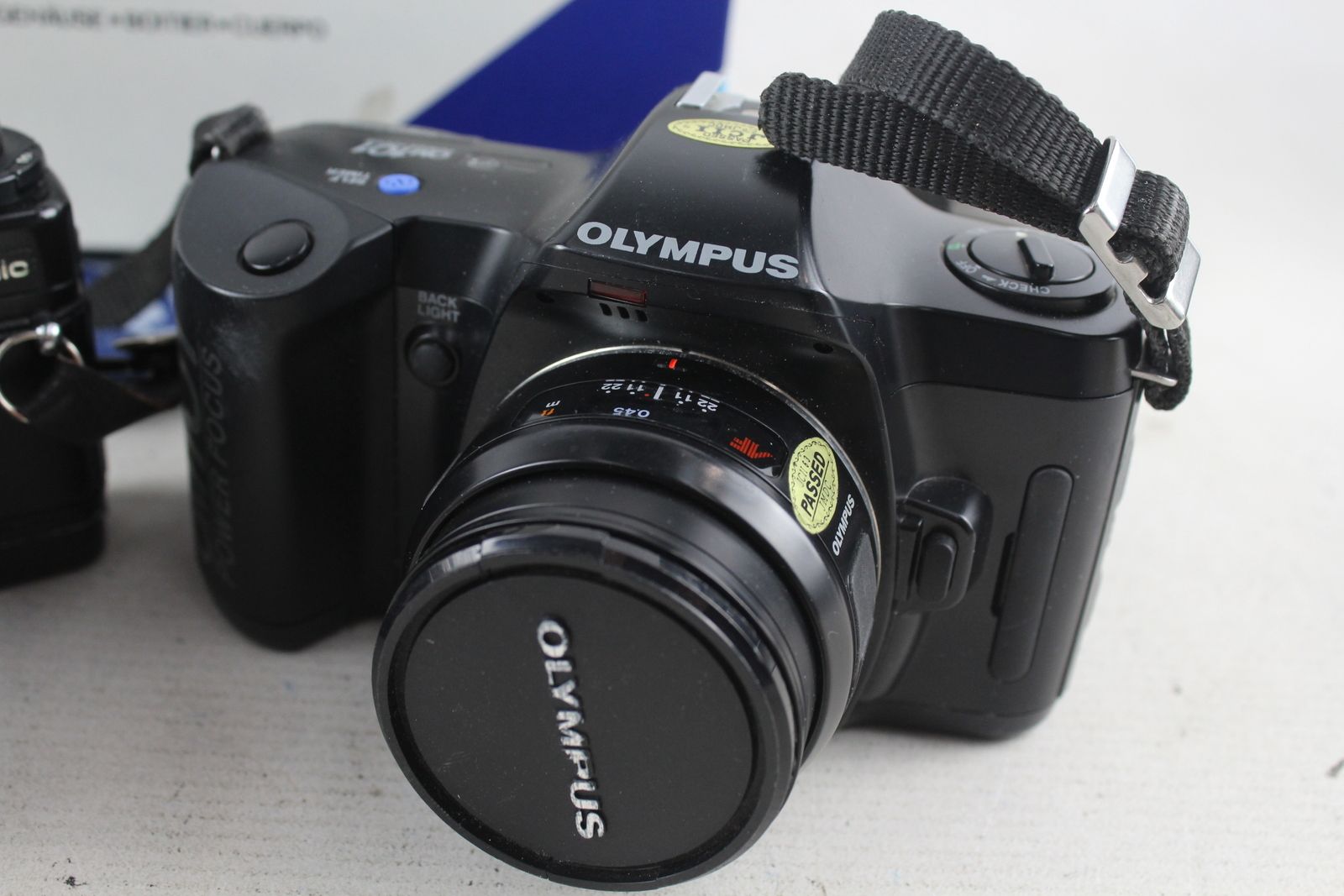 2 x SLR FILM CAMERAS Inc. Olympus OM101 w/ Olympus 50mm F/1.8 & Box