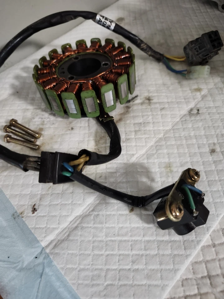 Estator *2012 Arctic Cat DVX 300 ATV (naranja)* Foto 2 de 4