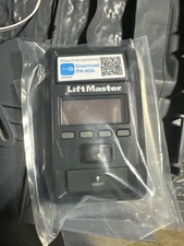 880LMW wall station liftmaster brand new