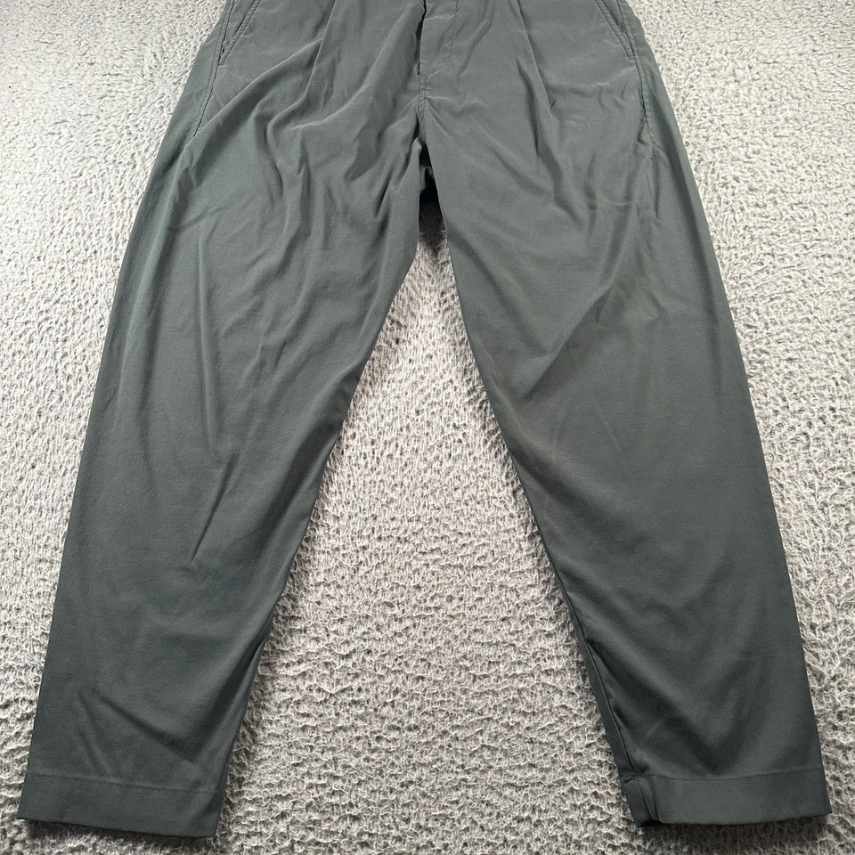 Pantalones Outlier Para Hombre 32 Verde Dos Vías Elastizados Nylon Cónico Plisado Chino Viaje Foto 3 de 4