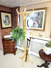 A compact, vintage Edwardian Bentwood style, revolving hat coat umbrella stand