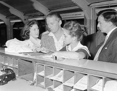American rock roll singer Jerry Lee Lewis signs immigration cards - 1958 Photo 1