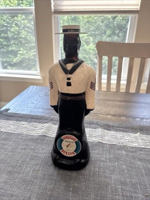 DOORLY'S BARBADOS RUM VINTAGE 13'' EMPTY SAILOR BOTTLE & ORIGINAL CAP WITH HAT