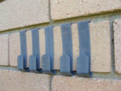 over brick wall hooks