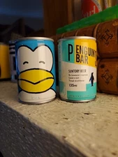 2 Suntory 135 ml Beer Cans Penguins.  Japan.  Top Opened. Steel.  Tab Top 
