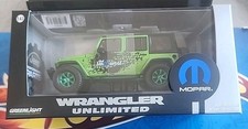 Greenlight Green Machine 2014 Jeep Wrangler Unlimited Mopar Chase 1:43 Scale