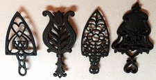 Lot 4 Vintage Cast Iron Wilton Trivets - 8 1/4" to 8 3/4" long