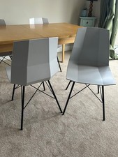 4 pale grey French Connection dining chairs with black metal legs