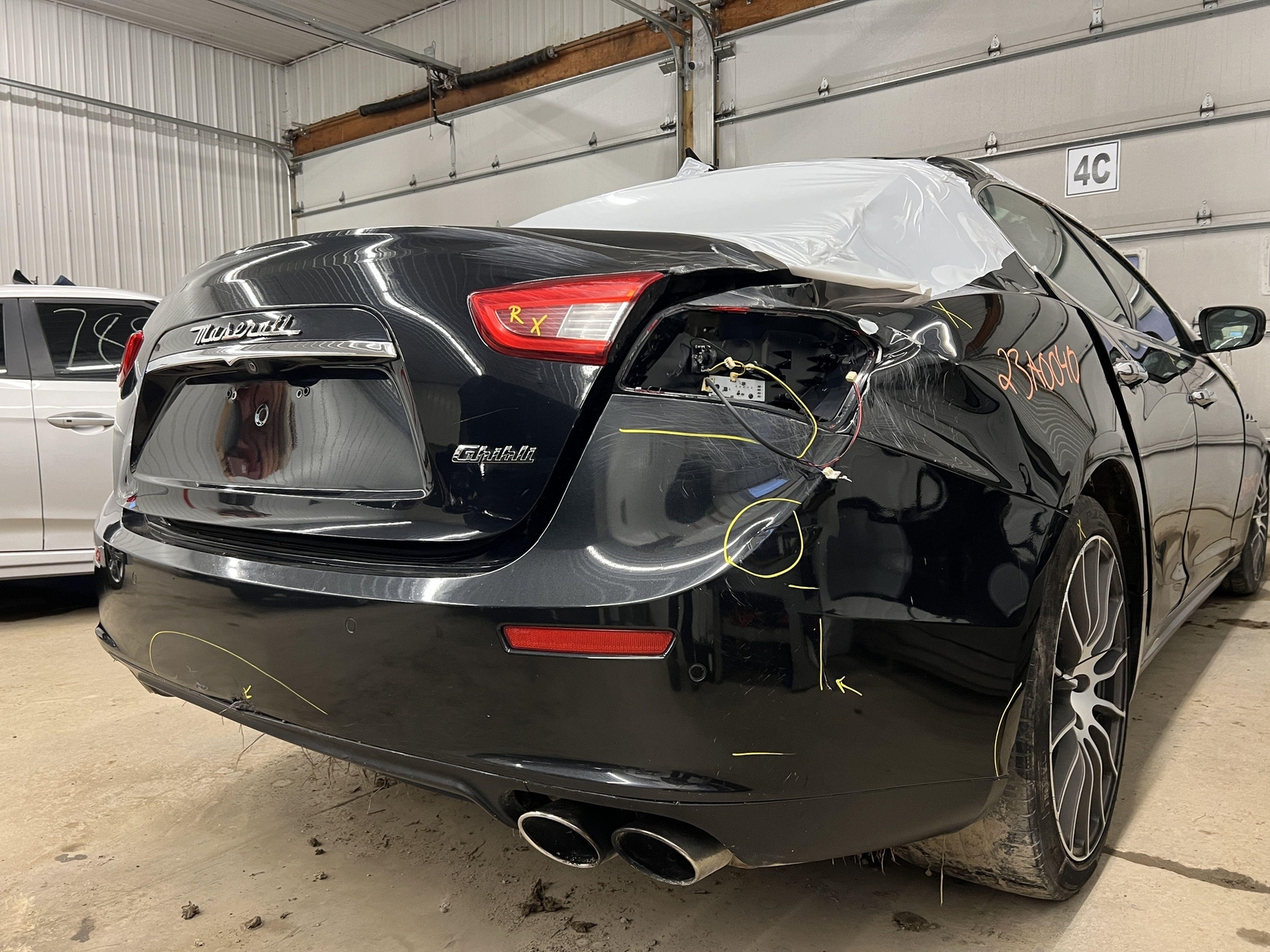 14-17 MASERATI GHIBLI REAR BUMPER COVER W/PARK ASSIST OPT NERO RIBELLE/BLACK