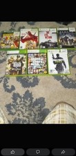 xbox 360 console with games and wireless controller