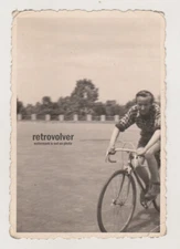 Speeding into the Frame Young Racer on Track Bike at Full Throttle Abstract Phot