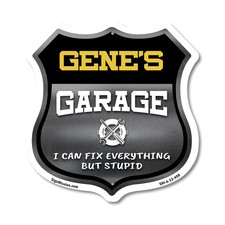 Gene's Garage I Can Fix Everything But Stupid Shield Shaped Sign Made in the USA