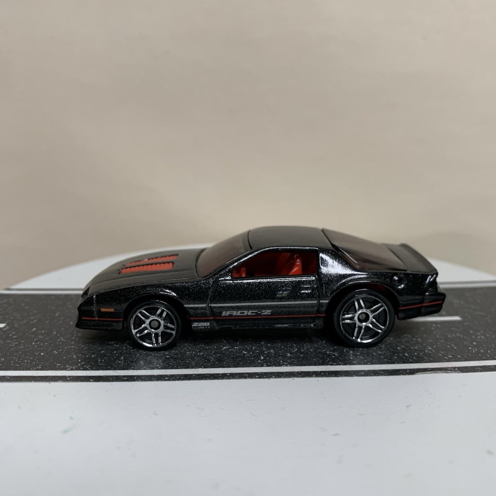 2012 Hot Wheels New Models #22 1985 Chevy Camaro IROC-Z Black/Red w/PR5 1:64 NM