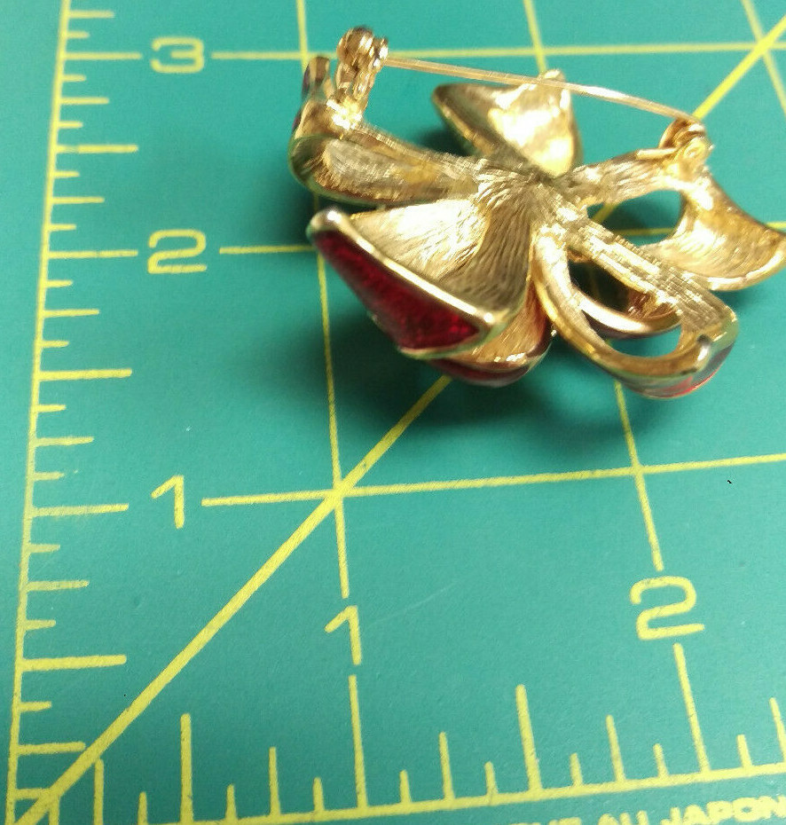 Red Ribbon Broche Vintage Red Ribbon Brooch with sparkly center Signed Roman approx 1 7/8 ...
