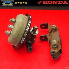 1986 HONDA FOURTRAX 200 TRX200SX FRONT RIGHT STEERING KNUCKLE + BRAKE DRUM HUBS