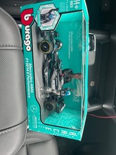 Burago 1:24 Mercede-AMG F1W14 E Performance w/George Russell 2in. Figurine