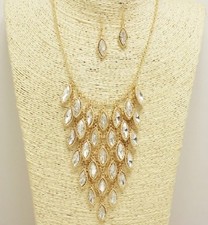 Gold and Clear Dangling Charms Necklace Set