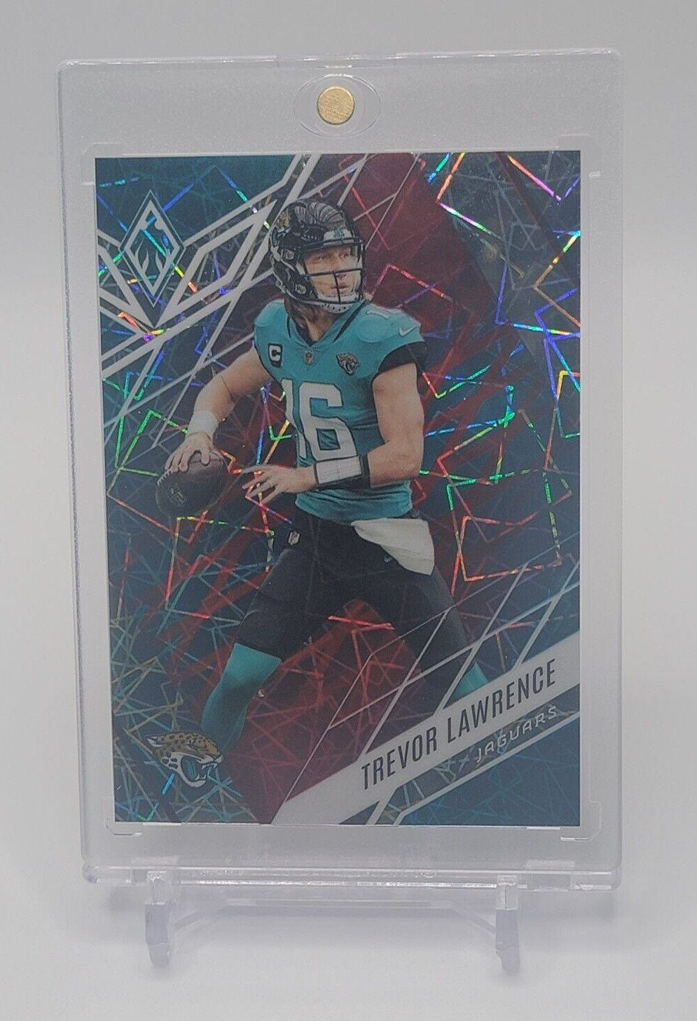 2022 Panini Phoenix Fire & Ice Lazer Prizm /50 Trevor Lawrence #33 - Jaguars