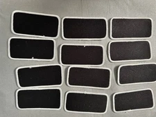 2 inch by 4 inch black sew on patch with a white border-lot of 12