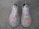 Vans Doheny women’s skate shoes with multicolor tie dye uppers, white laces, and black rubber soles, size 8.5.