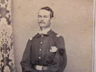 Civil War officer with 9th corps badge & sword wearing memorial ribbon cdv photo
