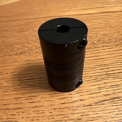 Helical Flexible Shaft Coupling. Bores=1/2  & 3/4 . OD=1.75 , L=2.75 , AL