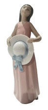 Nao Lladro Girl Holding a Hat Pink Dress