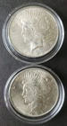 Two 1923 $1 Peace Silver Dollars in Capsules