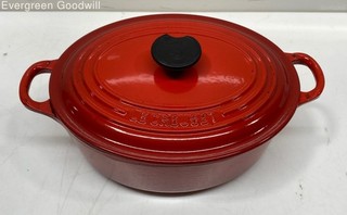 Red Le Creuset Enameled Cast Iron Oval Dutch Oven