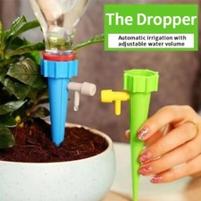 Flower pots watering system. Plants never dry. Plastic bottle Drip Feed Plants