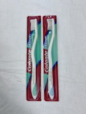 2 Colgate Wave Sensitive Toothbrushes light blue and light green NOS